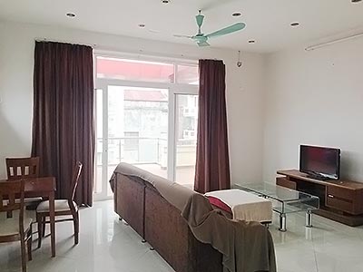 Bright and airy serviced 1BR apartment for rent in Xuan Dieu, Tay Ho.