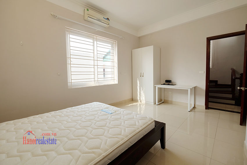 Modern 4 bedroom house with front yard to rent in Tay Ho 13